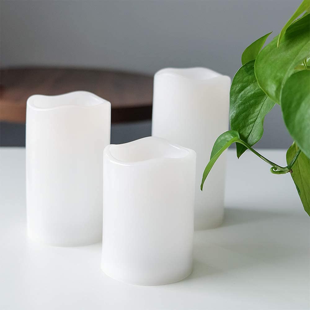 Eldnacele Waterproof Flameless Flickering Candles Weatherproof Battery Operated Led Candles With Remote And Timer White Plastic