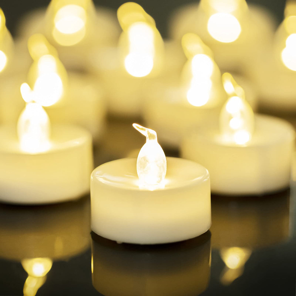 Lanker 24 Pack Led Tea Lights Candles - Warm White Flickering Flameless Tealight Candle - Long Lasting Battery Operated Fake Can