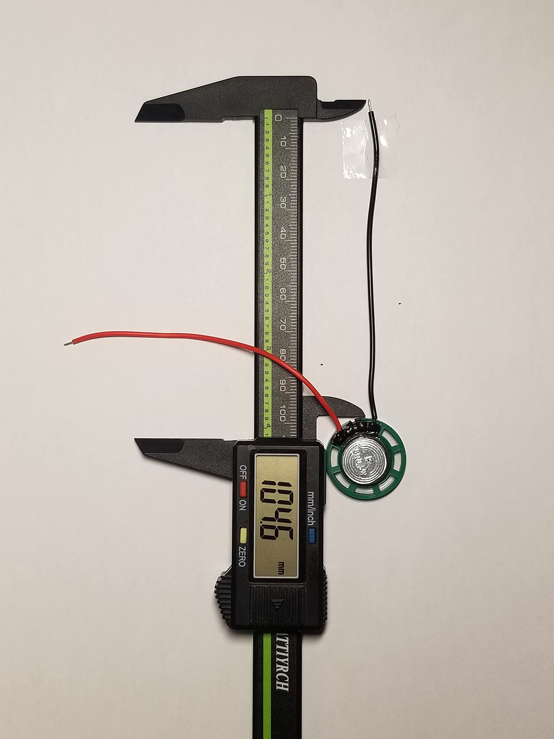 1In Speaker 26Mm 8 Ohm 1/4 Watt (0.25W) Nominal / 1/2 Watt (0.5 W) Maximum Power Output   Green Plastic Shell With 4 In (104 Mm) Wires