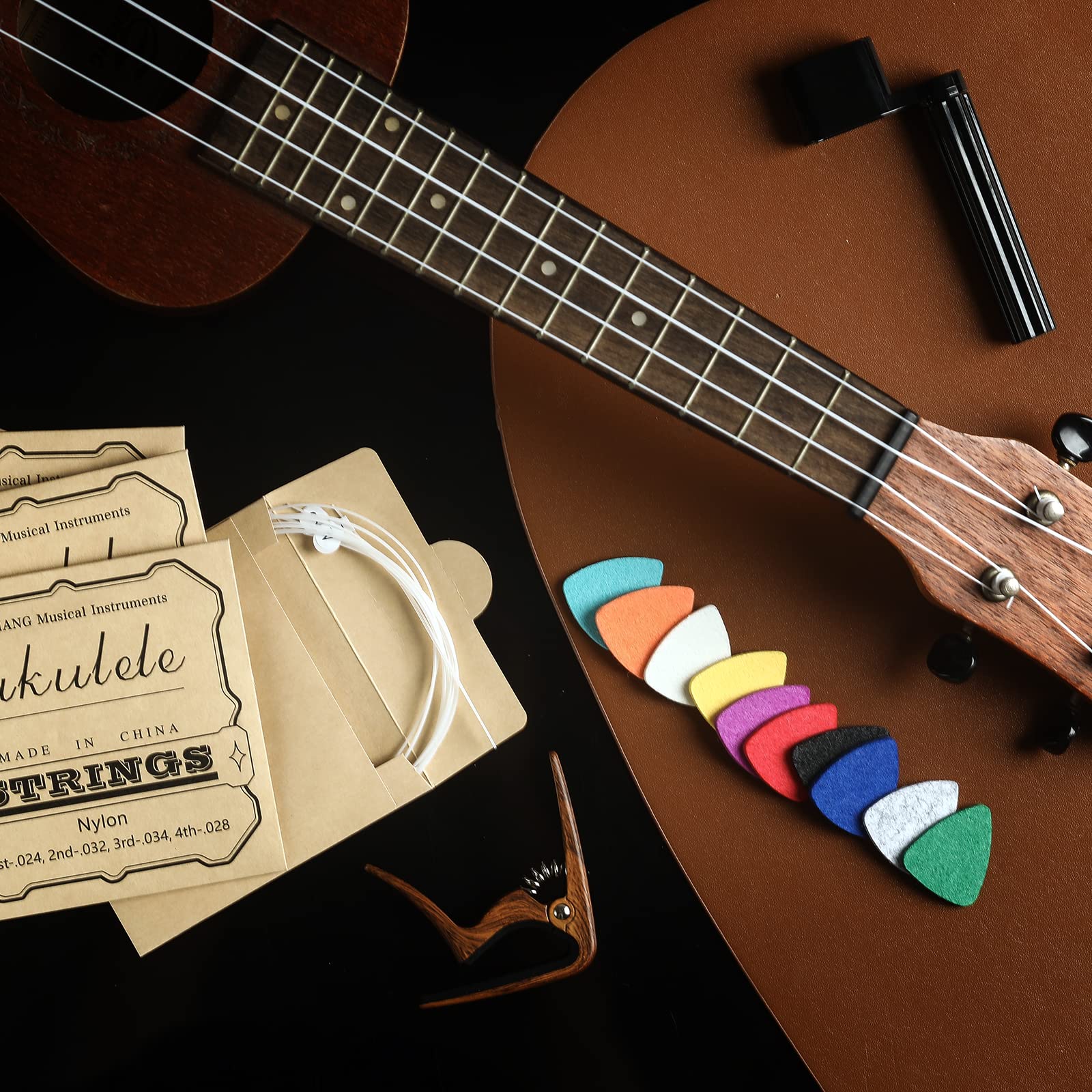 Donux Nylon Ukulele Strings Kit,Include 5 Sets Strings,10 Pieces Ukelele Felt Picks,Capo And String Winder For Soprano Concert A