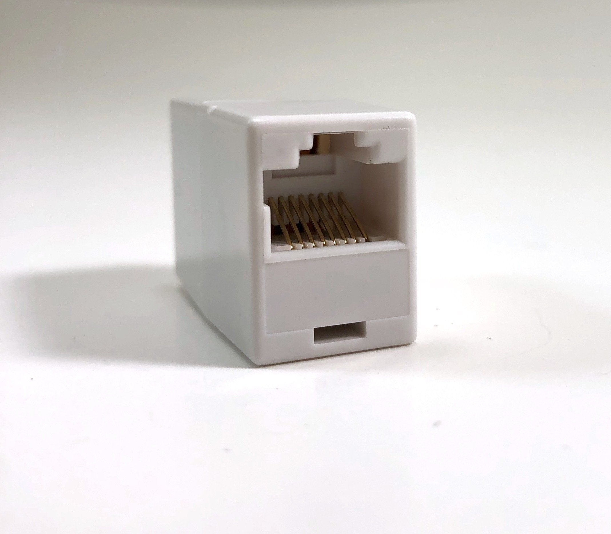 Micro Connectors, Inc. Cat 5E Rj45 Stright Through Coupler Female To Female   White(C20 110L5W)