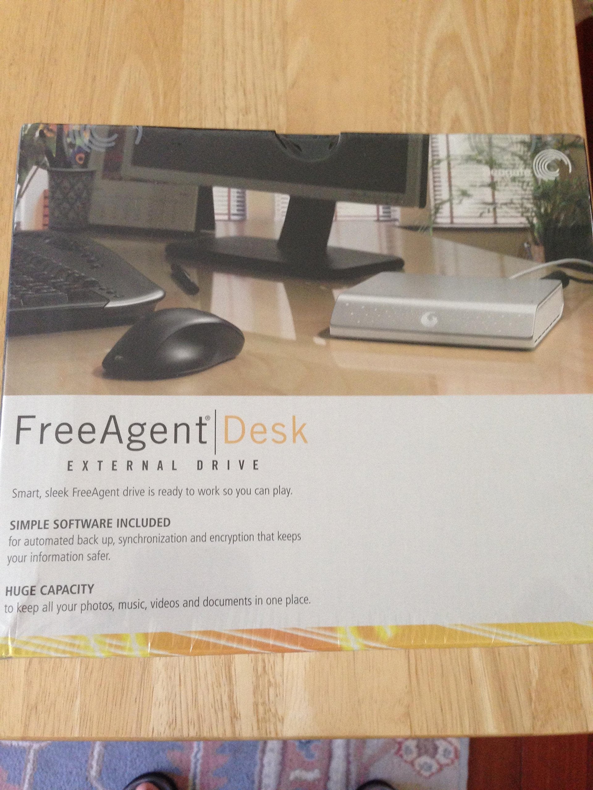 Seagate FreeAgent Desk 1 TB USB 2.0 Desktop External Hard Drive ST310005FDA2E1 RK (Silver)