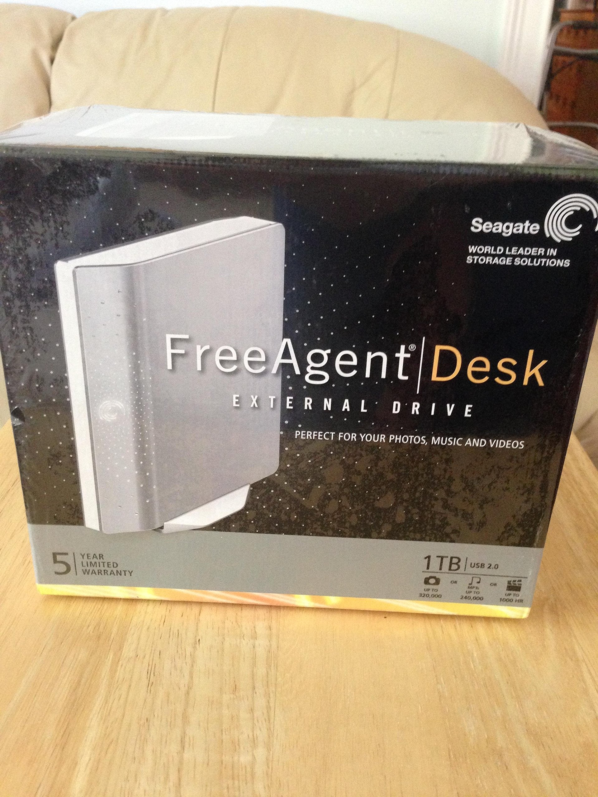 Seagate FreeAgent Desk 1 TB USB 2.0 Desktop External Hard Drive ST310005FDA2E1 RK (Silver)
