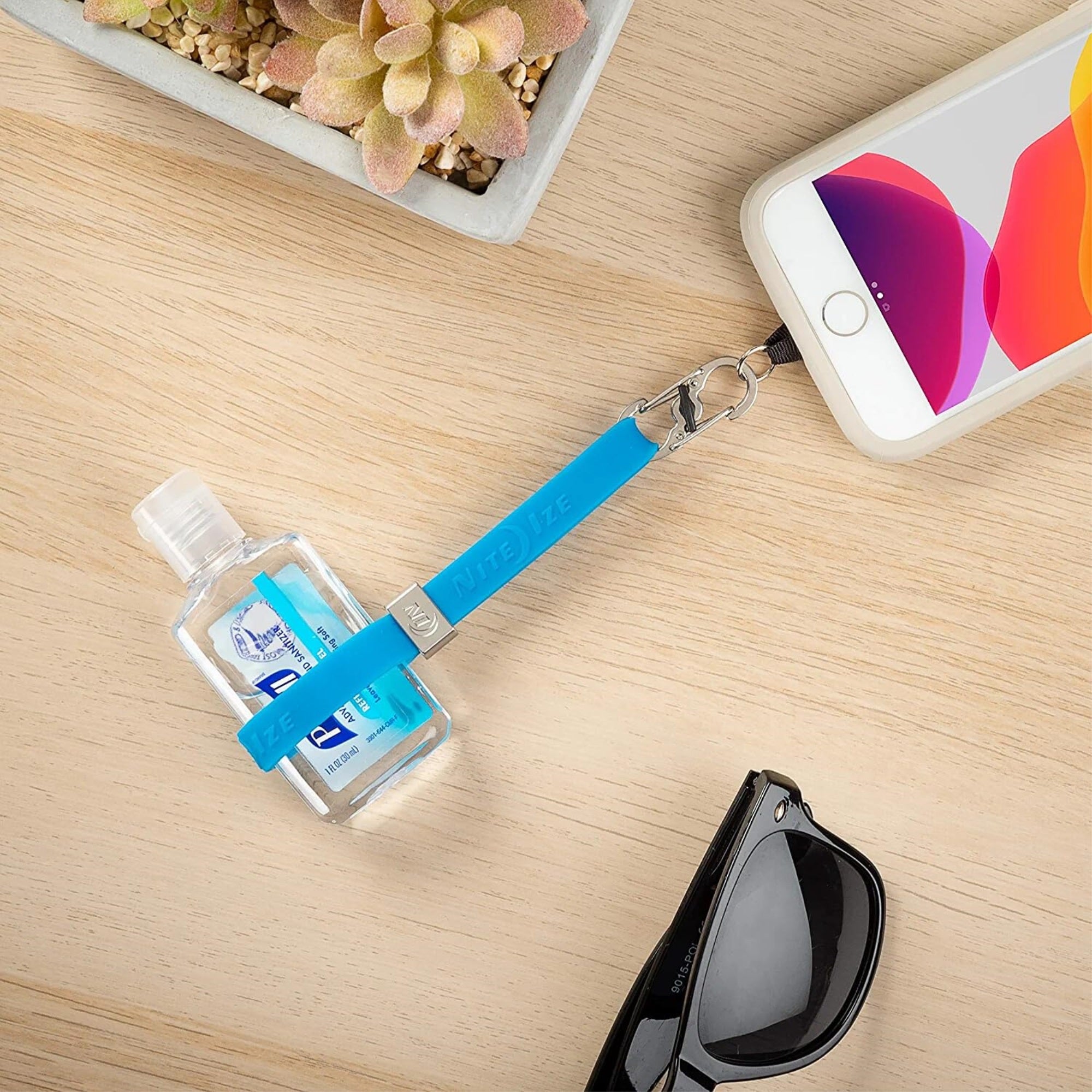 2023 Nite Ize Hitch Phone Anchor + Stretch Strap Blue, Map: $13.49